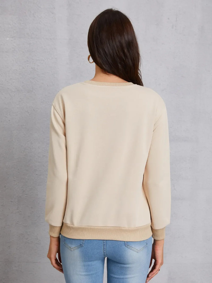 Khaki sweatshirt with crew neck and ribbed cuffs and hem.