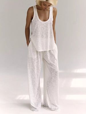 White cropped tank and wide-leg lounge pants set with a scoop neck and relaxed fit.
