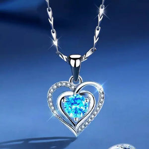 925 sterling silver,Zircon Care instructions: Avoid wearing during exercise, as necklace in blue with pendant silhouette