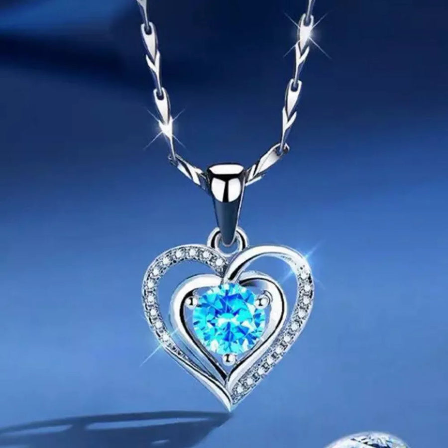 925 sterling silver,Zircon Care instructions: Avoid wearing during exercise, as necklace in blue with pendant silhouette