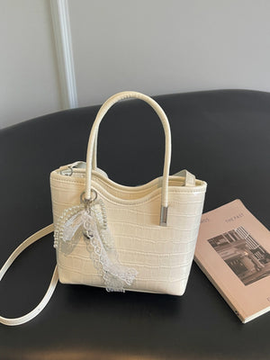 crossbody bag featuring animal-print in Off-white with PU Leather Imported Size & texture