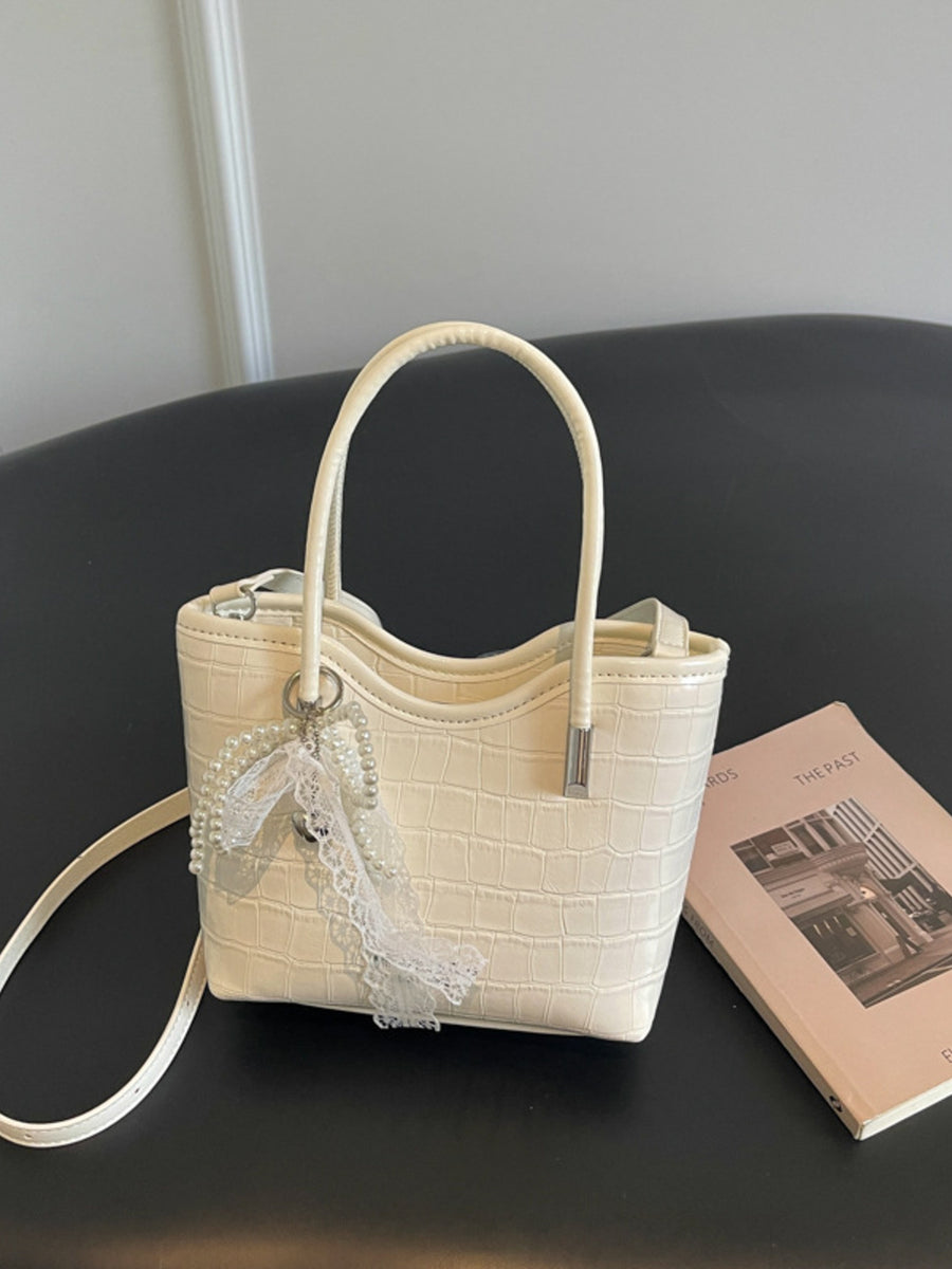 crossbody bag featuring animal-print in Off-white with PU Leather Imported Size & texture