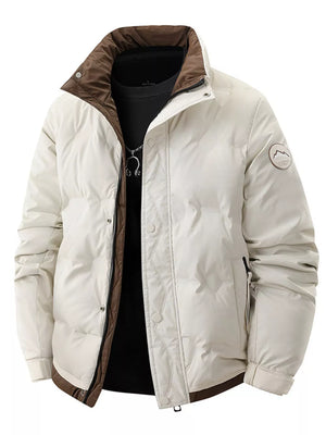 Beige padded puffer jacket with brown collar and trim, zip and button closure.