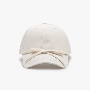 Ivory baseball cap with tied back detail