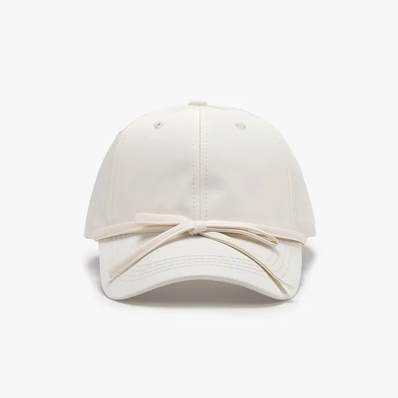 Ivory baseball cap with tied back detail