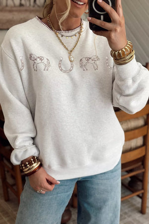 Light Gray sweatshirt featuring ribbed cuffs and graphic