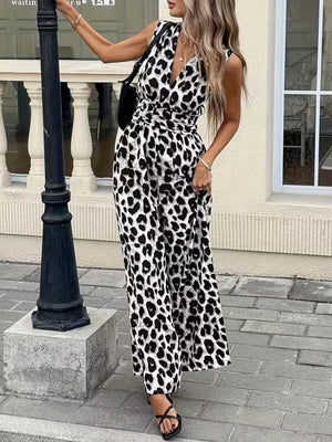 Sleeveless leopard print romper with V-neck and belted waist.