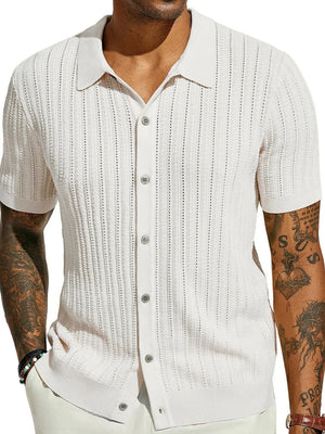 Cream textured knit polo shirt with openwork detail and short sleeves.