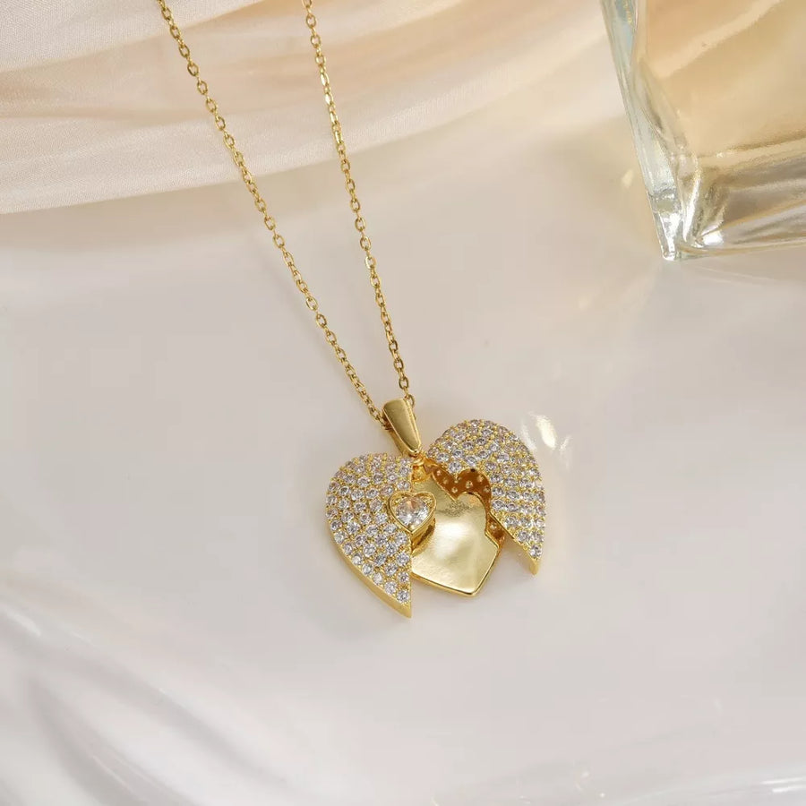 18K Gold-Plated,Titanium Steel,Rhinestone Care instructions: Avoid wearing durin necklace in clear with heart silhouette