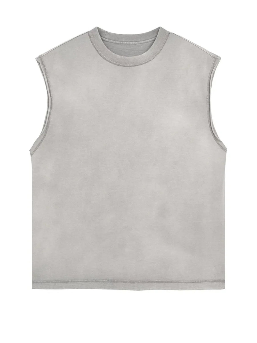 Gray washed cotton cut-off tank top with crew neck and raw hem.