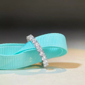 ring in silver featuring moissanite stones and fitted fit