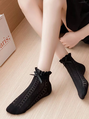 White socks featuring lace and geometric