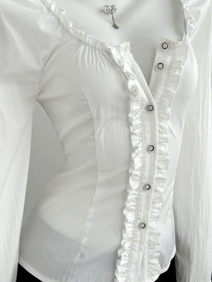white blouse with hip-length and button-front