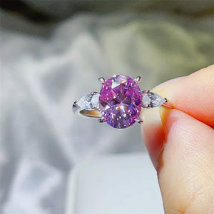 ring in purple featuring three-stone setting and three-stone fit