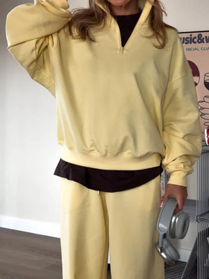 65%Cotton,35%Polyester Care instructions: Machine wash cold sweat set in Light Gray with oversized, wide-leg silhouette