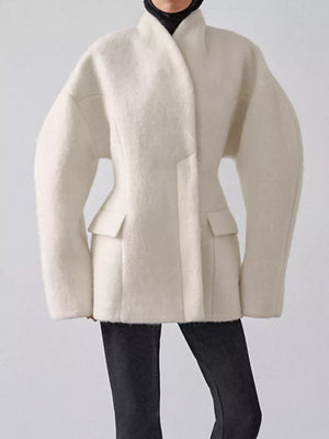 coat in cream featuring pocketed and regular fit