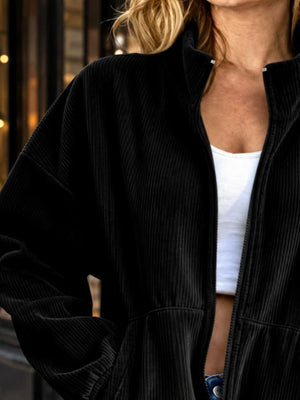 95% polyester, 5% spandex Care instructions: Machine wash cold bomber jacket in Black with relaxed silhouette