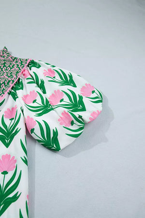 White polyester blouse with pink floral print and puff sleeves.