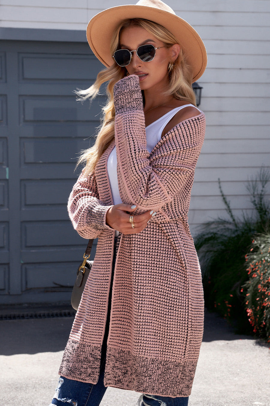 Pink textured puff sleeve open cardigan with contrasting cuffs and hem