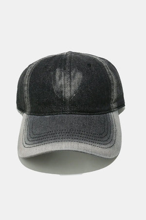 Bleached heart black baseball cap with a faded denim look.