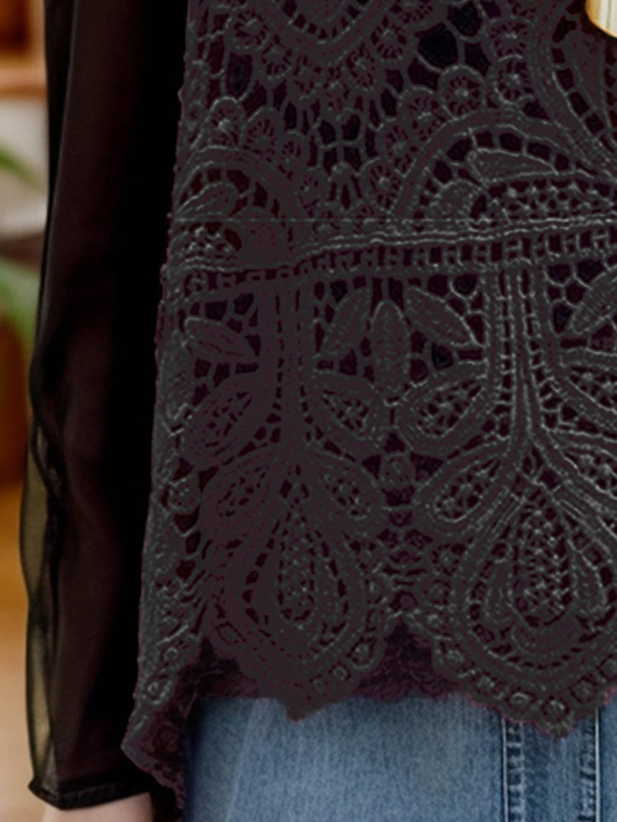 Lace overlay cropped vest in deep purple with intricate floral pattern and sheer sleeves.
