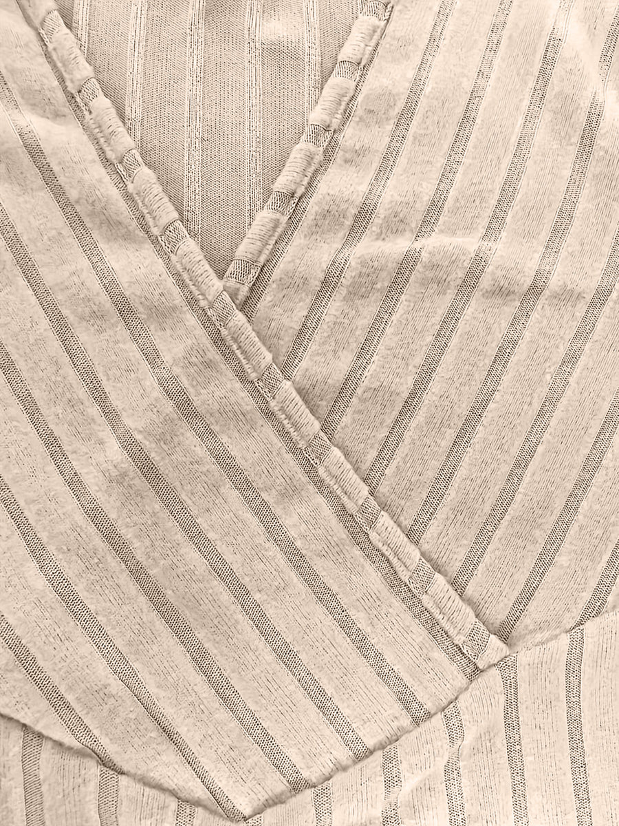 Ribbed wrap top in Caramel with a plunging neckline and pinstripe pattern.