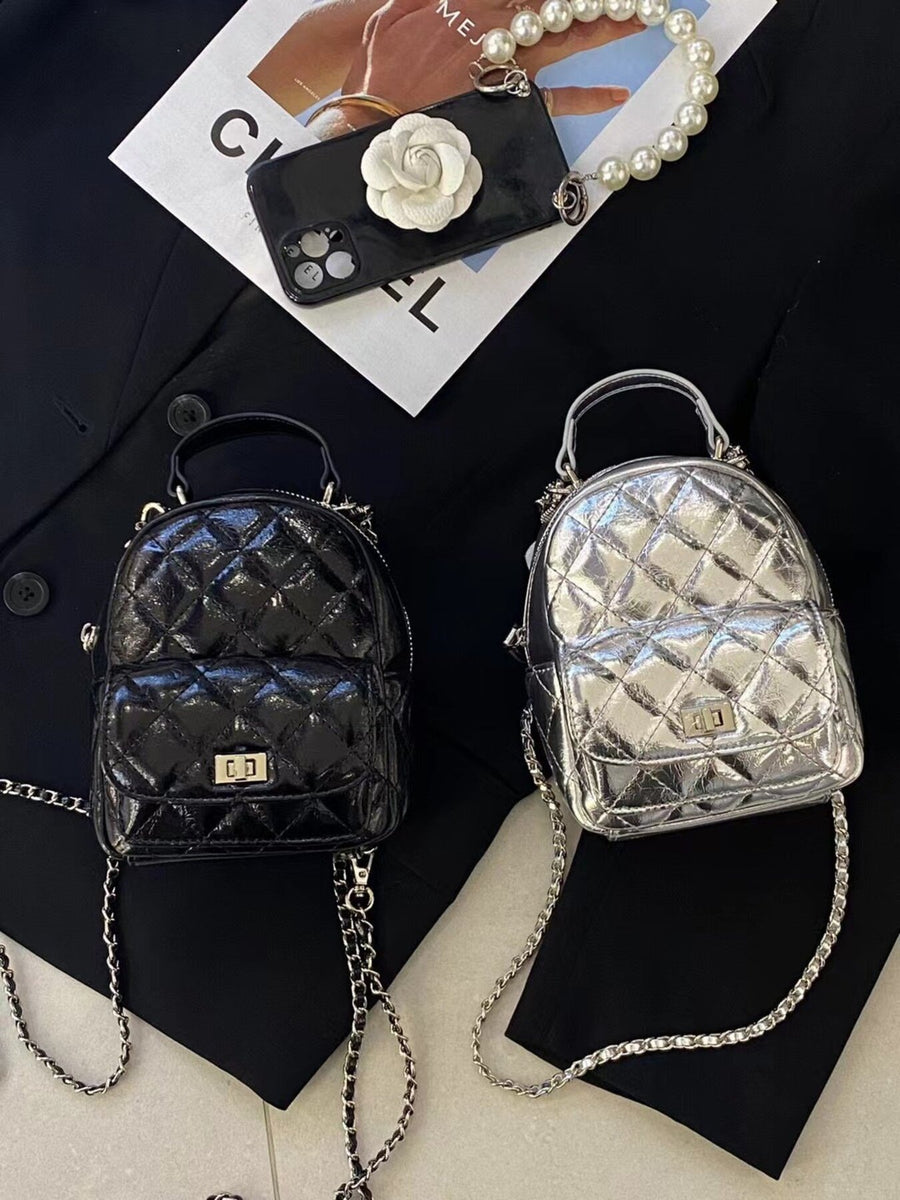 black backpack featuring quilted and quilted