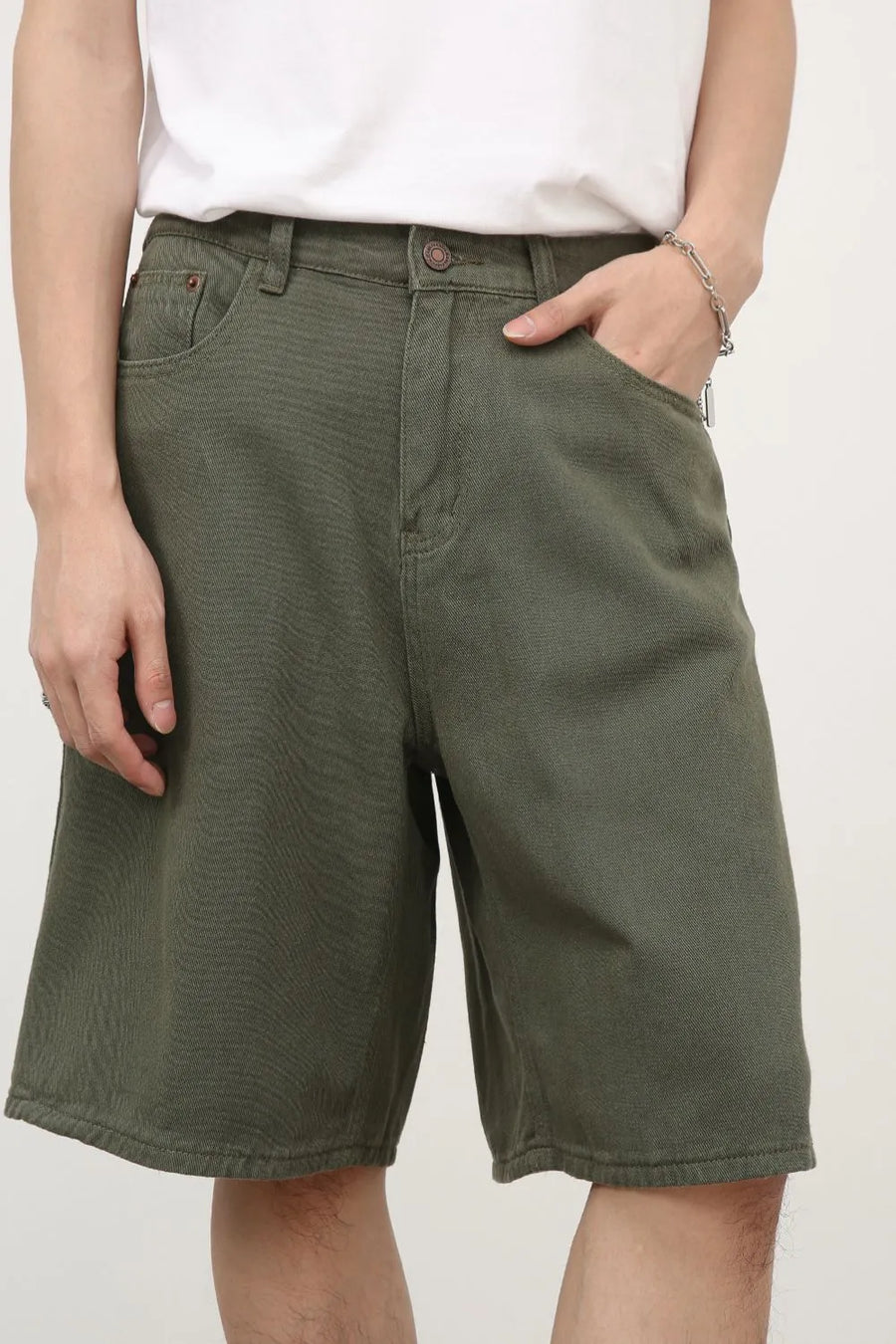 Textured denim Bermuda shorts in Army Green with a casual fit.