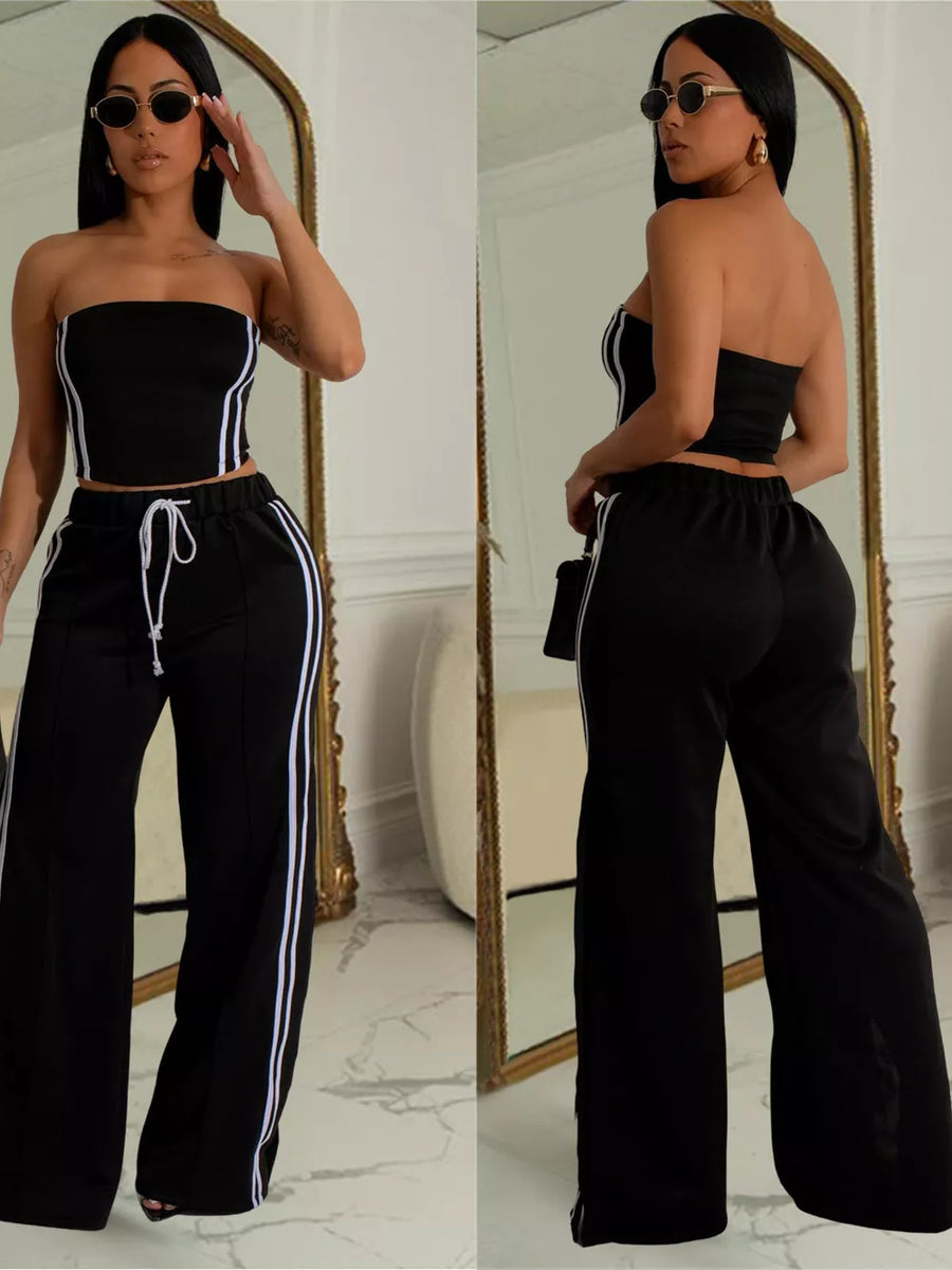 Black tube top outfit set with white side stripes on wide-leg pants and drawstring waist.