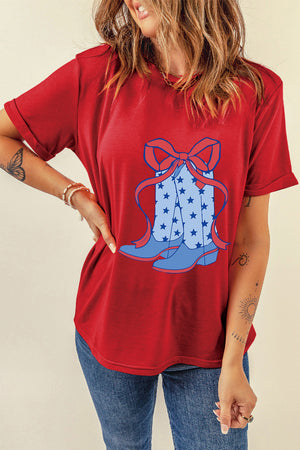 Red t-shirt with cowboy boot and bow graphic, star pattern on boots