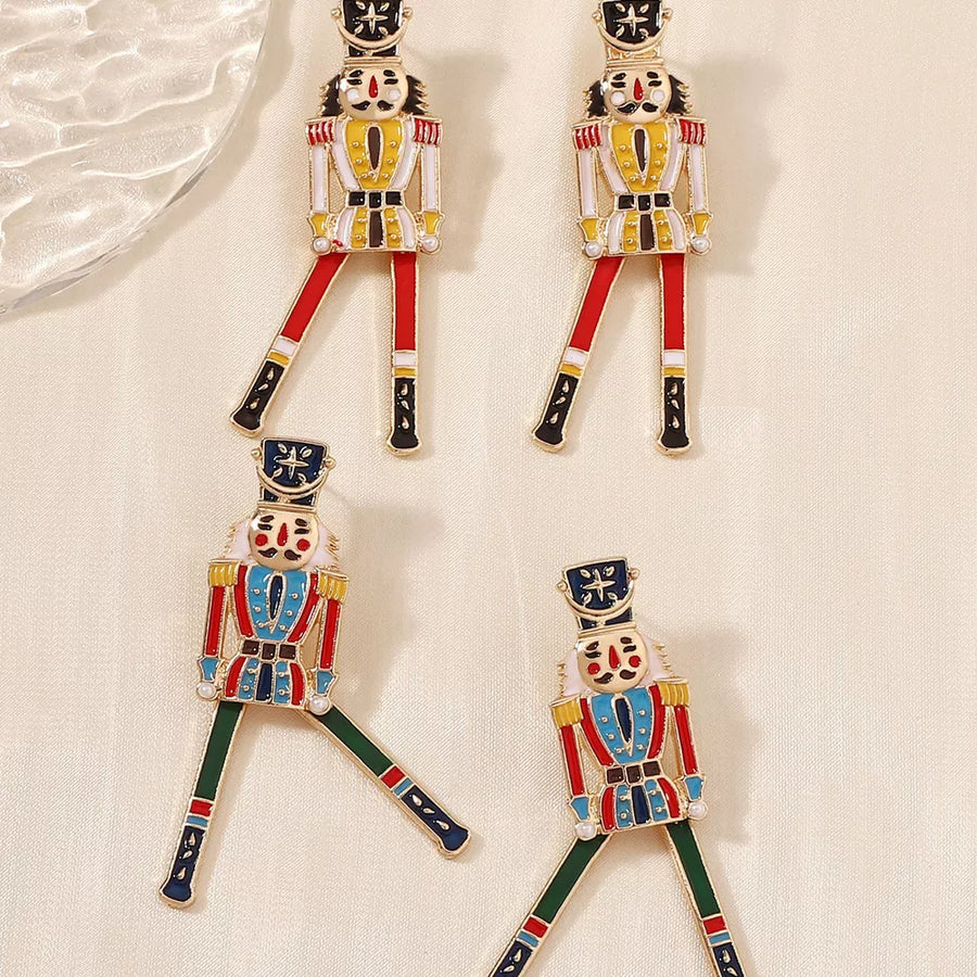 gold earrings with figural and not applicable