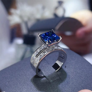 Platinum-Plated,925 sterling silver,Moissanite,Zircon (accent stones) Carat weig ring in silver with band silhouette
