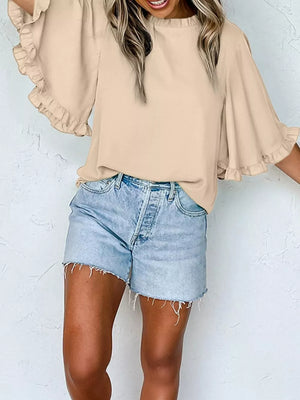 Apricot ruffled mock neck half sleeve shirt with bell sleeves.