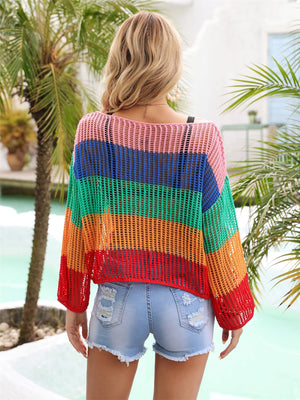 Rainbow mesh cover-up with flared sleeves and a relaxed fit, styled with denim shorts.