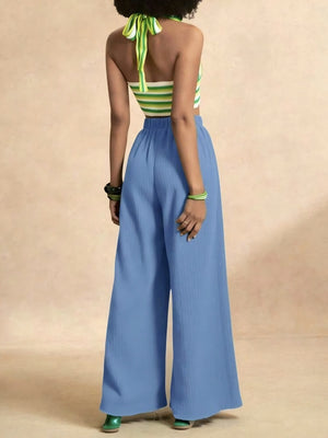 100% polyester Care instructions: Machine wash cold wide-leg pants in White with flared silhouette