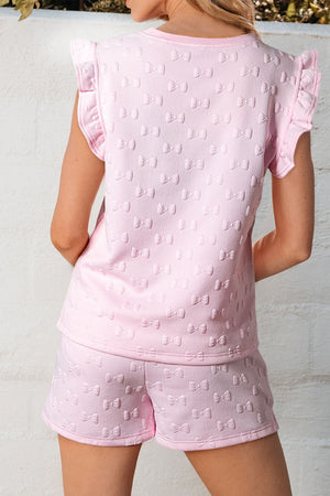 Pink textured bow print shorts with ruffled cap sleeves