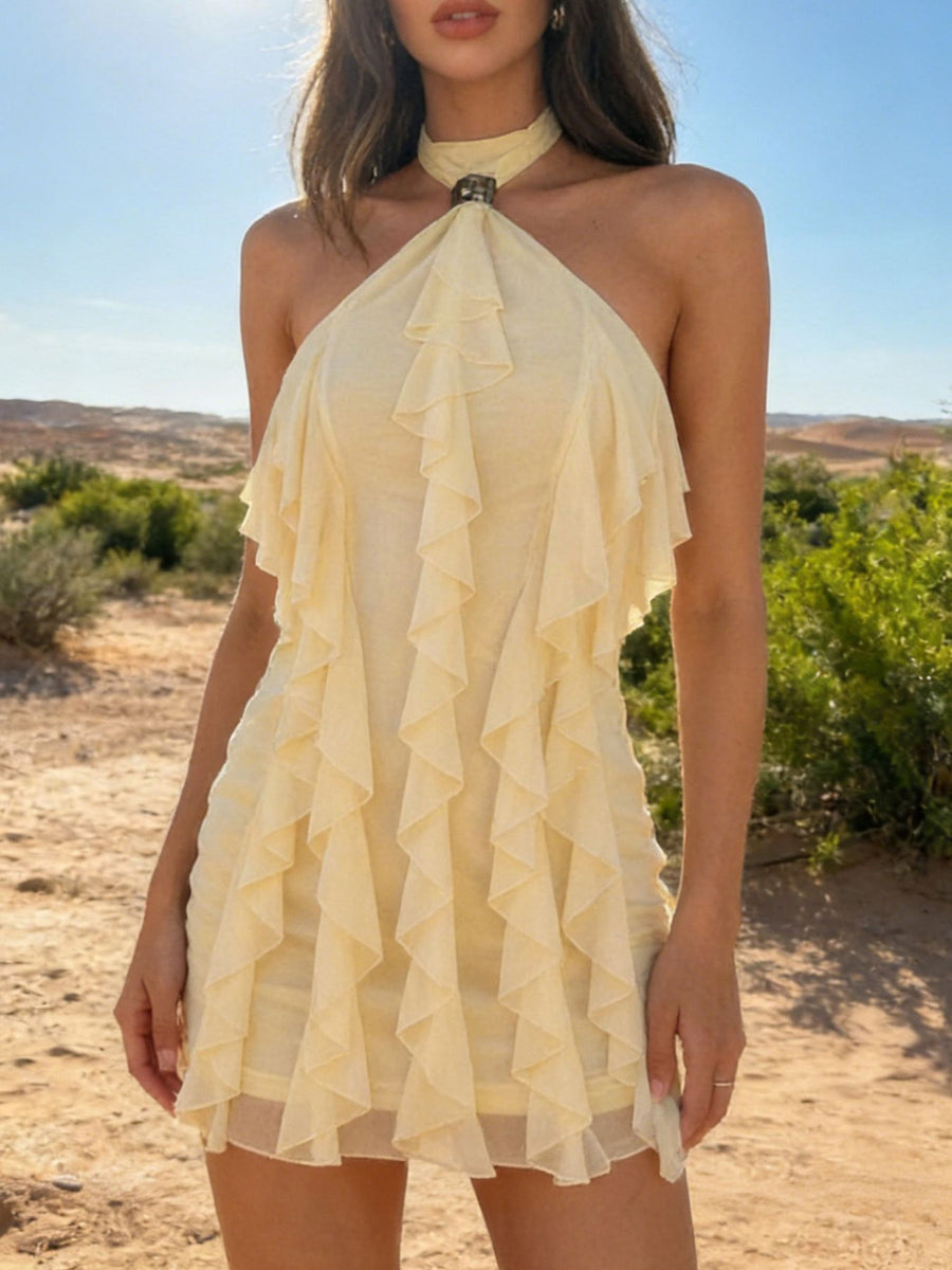 Pastel yellow ruffle halter mini dress with choker detail and tiered ruffles.