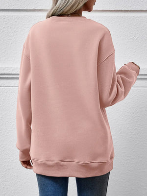 Blush pink polyester drop shoulder sweatshirt with crewneck and ribbed cuffs and hem