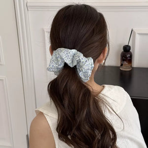 blush pink scrunchie with elastic and plaid