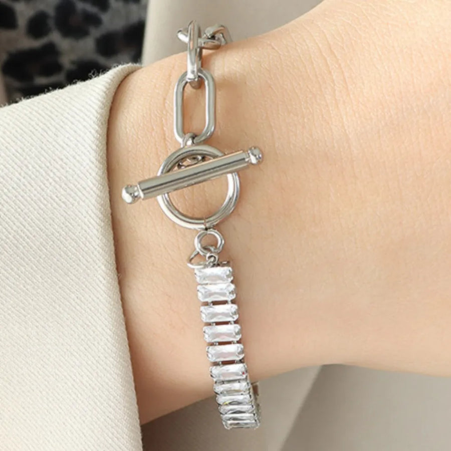 Silver chain toggle bracelet with baguette zirconia charm