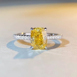 ring in yellow featuring center stone and band fit