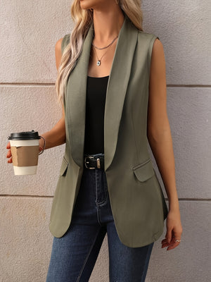 Moss shawl collar sleeveless vest coat with flap pockets and a draped lapel.