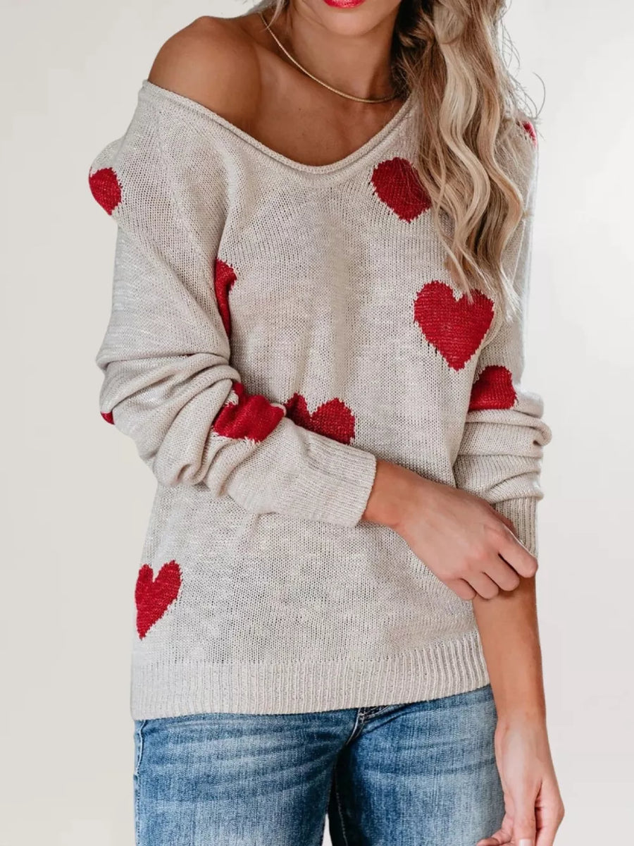 red pullover sweater featuring ribbed and heart-print
