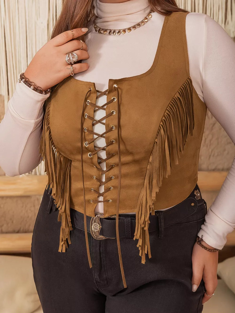 Caramel faux suede cropped vest with fringe and lace-up front.