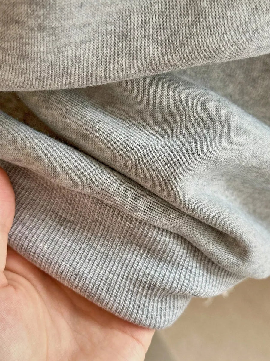 Brown sweatshirt with hip-length and quarter-zip