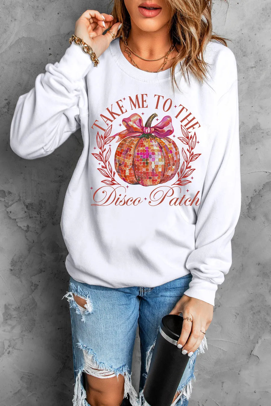 White crewneck sweatshirt with a disco ball pumpkin graphic and text.