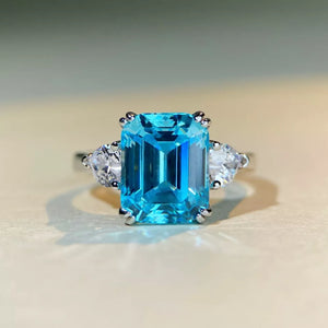 ring in aqua blue featuring emerald cut stone and classic fit