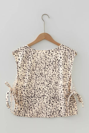 Knot detail leopard print tank top in cream and black with a scoop neck.