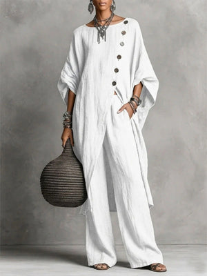 two-piece set in white featuring buttoned and relaxed fit