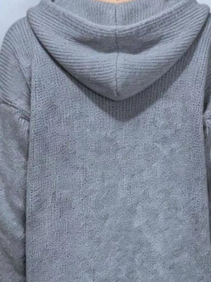 100% polyester Care instructions: Machine wash cold cardigan in Black with relaxed silhouette